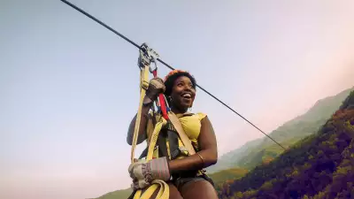 North Carolina | A young woman zip lining in North Carolina