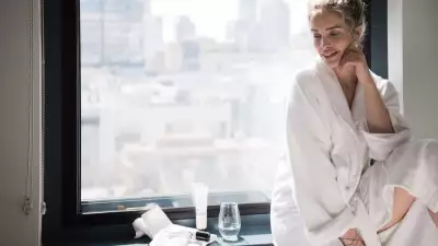 A guest enjoys the in-room Radford Studio services at the Kimpton Saint George Hotel