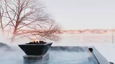 Strom Nordic Spa, Québec | A person sitting in a thermal bath at Strøm Nordic Spa — Old Québec