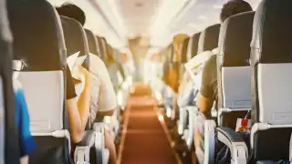 passenger punched reclined seat on American Airlines flight