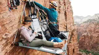 Climbers on a portaledge, Moonlight Buttress, Zion National Park, Utah Climbers on a portaledge, Moonlight Buttress, Zion National Park, Utah