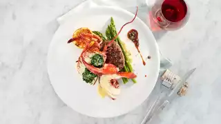 Win dinner for two at the CN Tower's 360 Restaurant | Steak and lobster dish