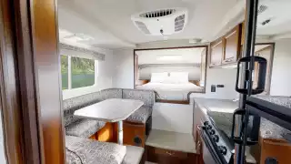 CanaDream: RV rentals in Ontario | The kitchen and sleeping area inside one of CanaDream's vehicles CanaDream: RV rentals in Ontario | The kitchen and sleeping area inside one of CanaDream's vehicles