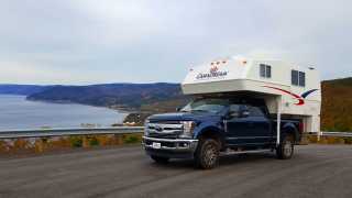 CanaDream: RV rentals in Ontario | A CanaDream Maxi Travel Camper driving by the water