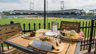 New Hampshire restaurants and activities | Sitting on the Patio at the Northeast Delta Dental Stadium