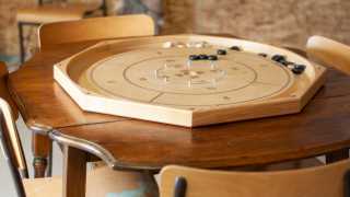Ontario's coolest cabins to rent | Playing crokinole at the Freija Forest Loft