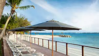Beachside loungers at Sandals Royal Bahamian