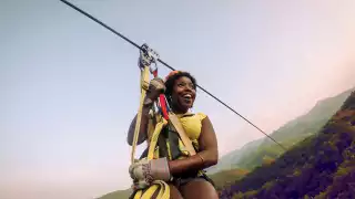 North Carolina | A young woman zip lining in North Carolina