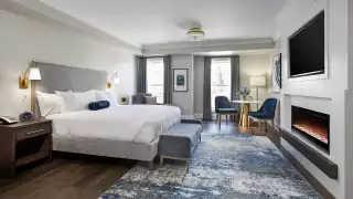 124 on Queen Hotel and Spa | A Signature Premium King room with a cozy fireplace