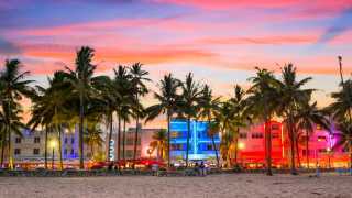South Beach, Miami, Florida | Art Deco buildings are lit up with neon lights on the Ocean Drive strip
