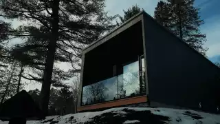 Outside of a cabin at Dimensions Algonquin Highlands
