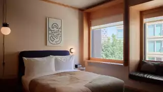 New Toronto hotels | A bedroom inside the Ace Hotel Toronto