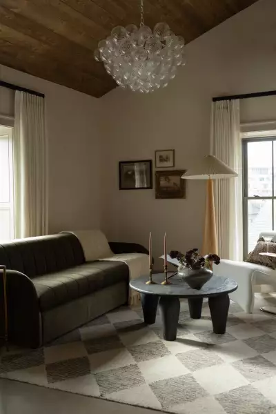 Living area in a guest room at The Kat Florence Hotel