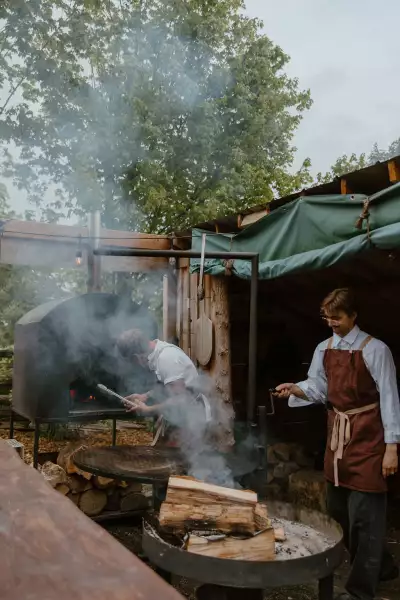 Grey County | Joel Gray and his staff cook outdoors over the hearth at Down Home in Grey County