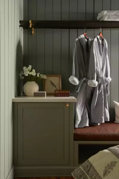 Grey County | Robes hang in a closet at June Motel Beaver Valley