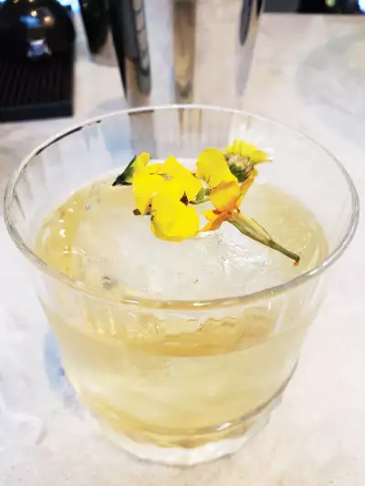 A Bee&rsquo;s Knees cocktail from Garden Room restaurant and bar at The Wildhive Callow Hall