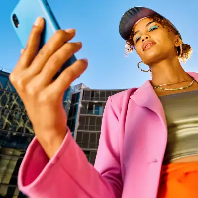 Sunwing Vacations Canada's Next Top Creators Competition | An influencer on her phone