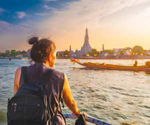 Travel tips | A woman travelling on a boat