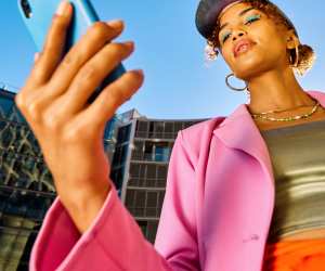 Sunwing Vacations Canada's Next Top Creators Competition | An influencer on her phone