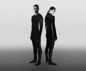 A man and a woman wearing the icebreaker Merino 200 Oasis+ Thermal Suit