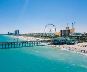 Myrtle Beach | A panoramic shot of the Second Avenue Pier, boardwalk and SkyWheel at Myrtle Beach