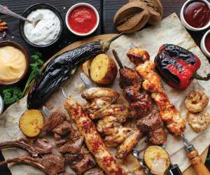 Mississauga | Roasted peppers and juicy kababs on a table