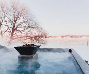 Strom Nordic Spa, Québec | A person sitting in a thermal bath at Strøm Nordic Spa — Old Québec
