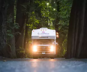 CanaDream: RV rentals in Ontario | A CanaDream Maxi Travel Camper in the woods