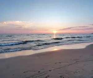 Breathtaking Ontario beaches | A sunset over Sauble Beach on Lake Huron