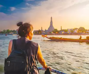 Travel tips | A woman travelling on a boat